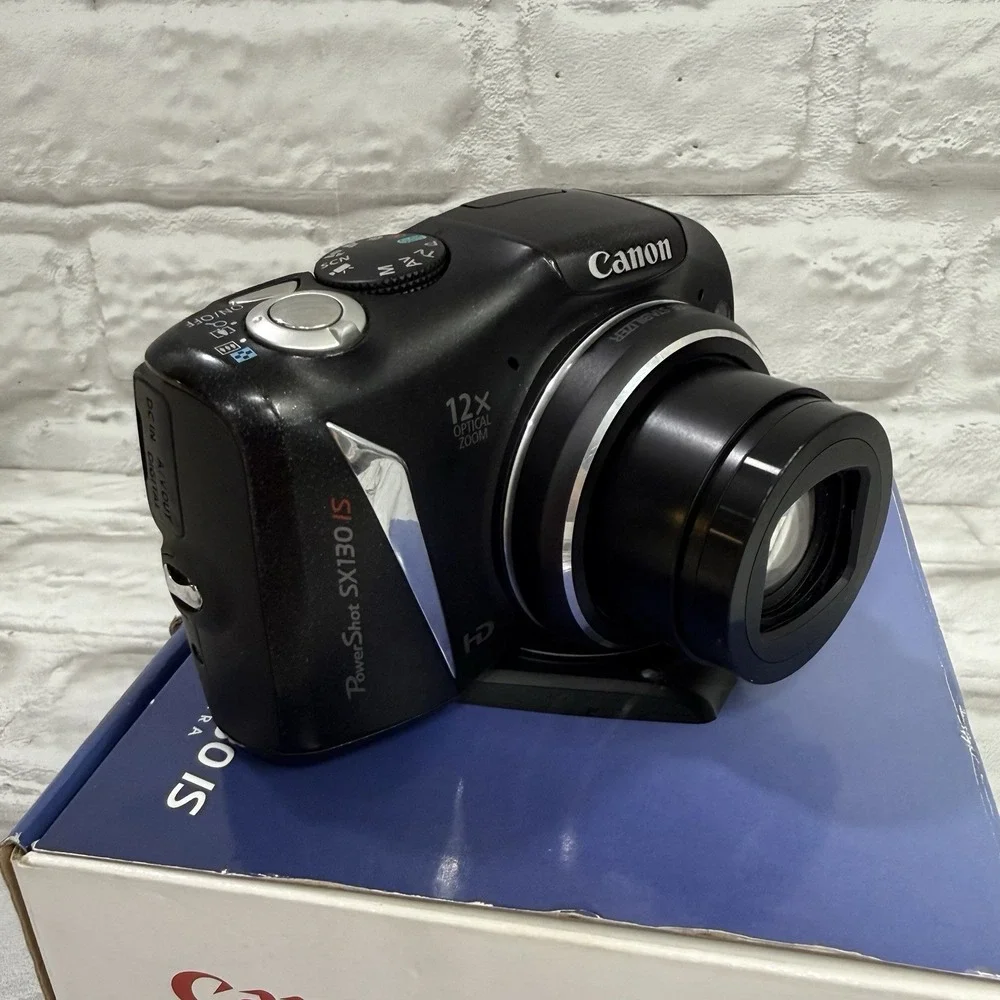 Canon SX130 IS Powershot Digital Camera 12x Optical Zoom 12.1 MP Black Excellent
